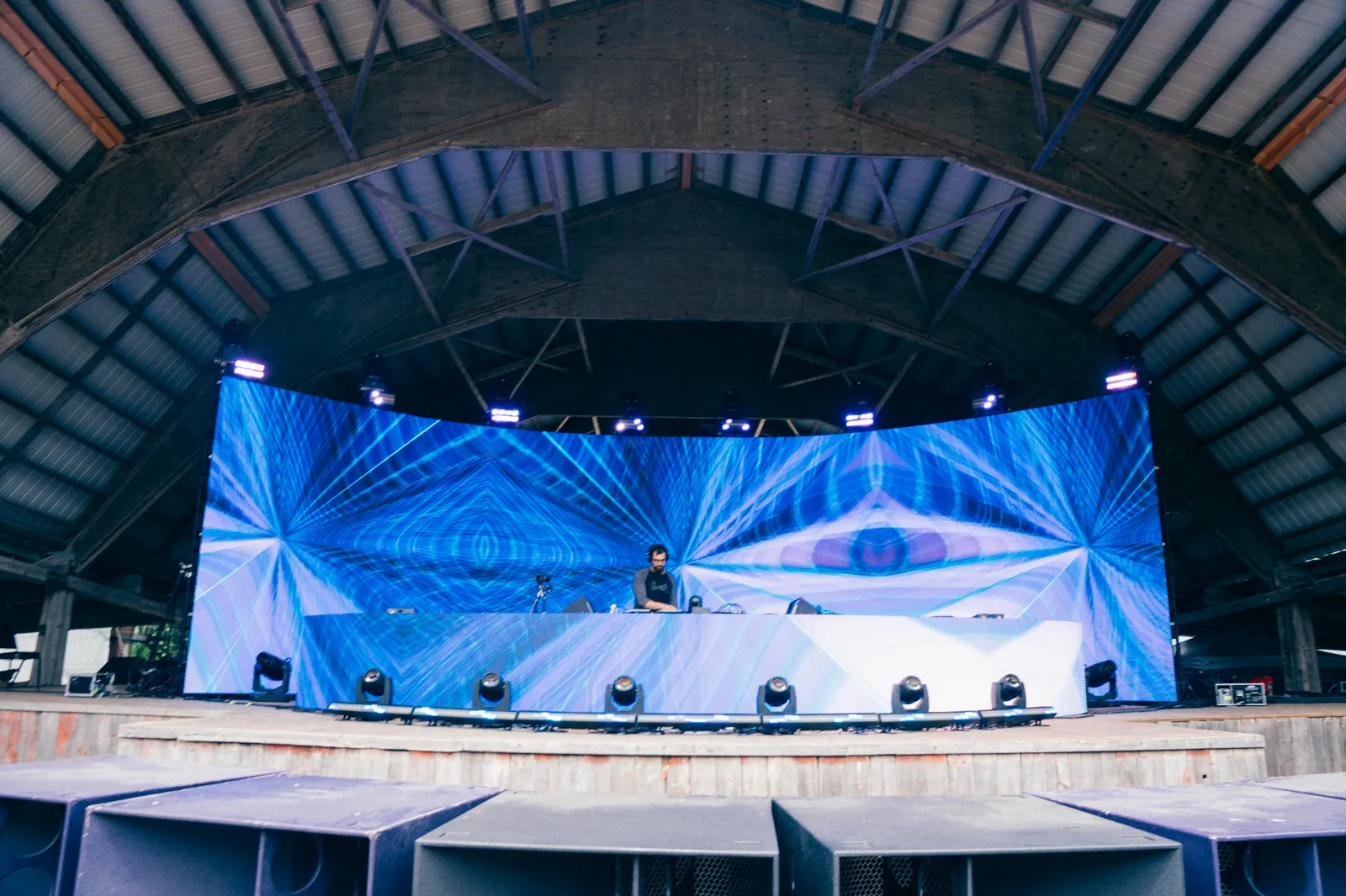 amphitheater stage bathed in blue light